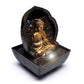 Fontaine à eau Bouddha en prière
