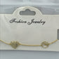 Bracelet fantaisie fin avec pendant coeur à zirconiums incrustés